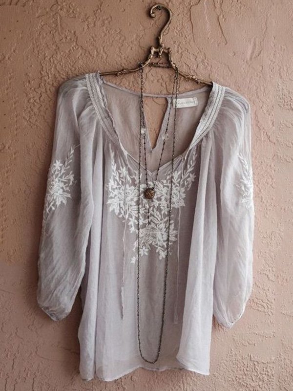 Gemusterte Bluse mit V-Ausschnitt