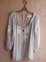 Gemusterte Bluse mit V-Ausschnitt